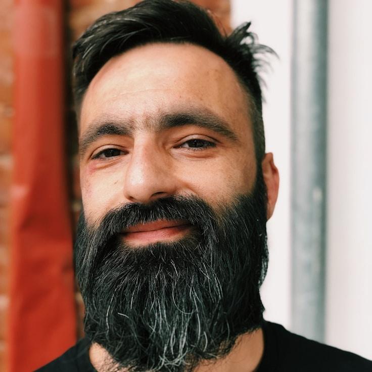 Portrait of Alex, community mentor and Italian cuisine specialist